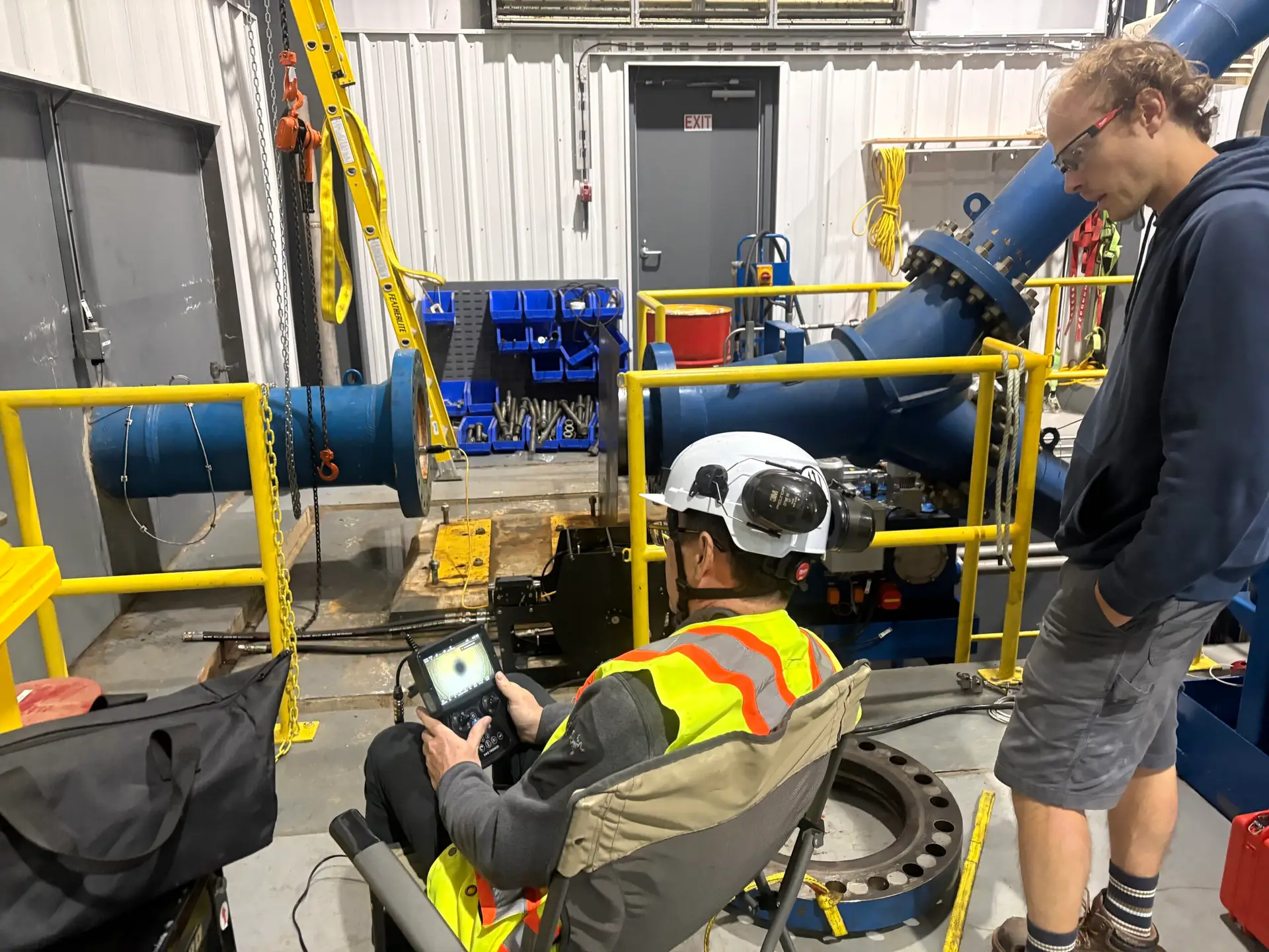 Ven-Tech team operating a pipe inspection crawler at a hydroelectric facility