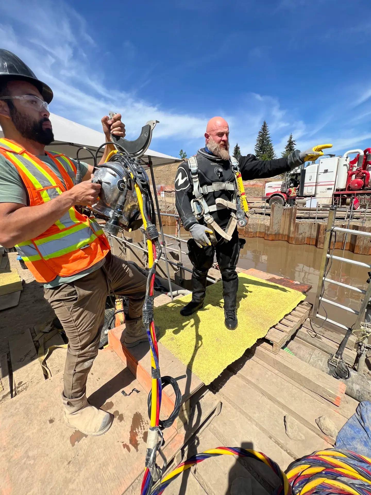 Commercial diver completing a pre-dive safety inspection
